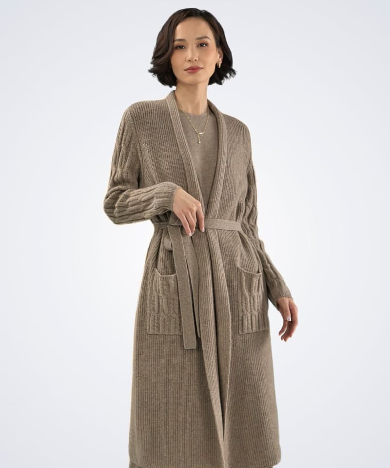 Front view of model wearing soft cashmere ribbed cardigan in natural brown