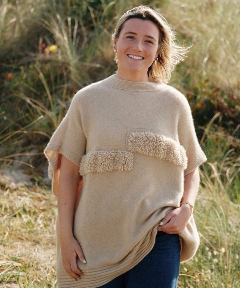 Women's natural beige cashmere ribbed poncho on model