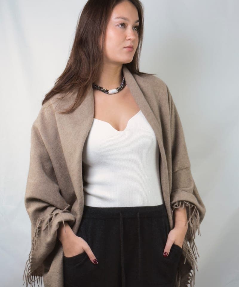 woman wearing a natural brown cashmere shawl